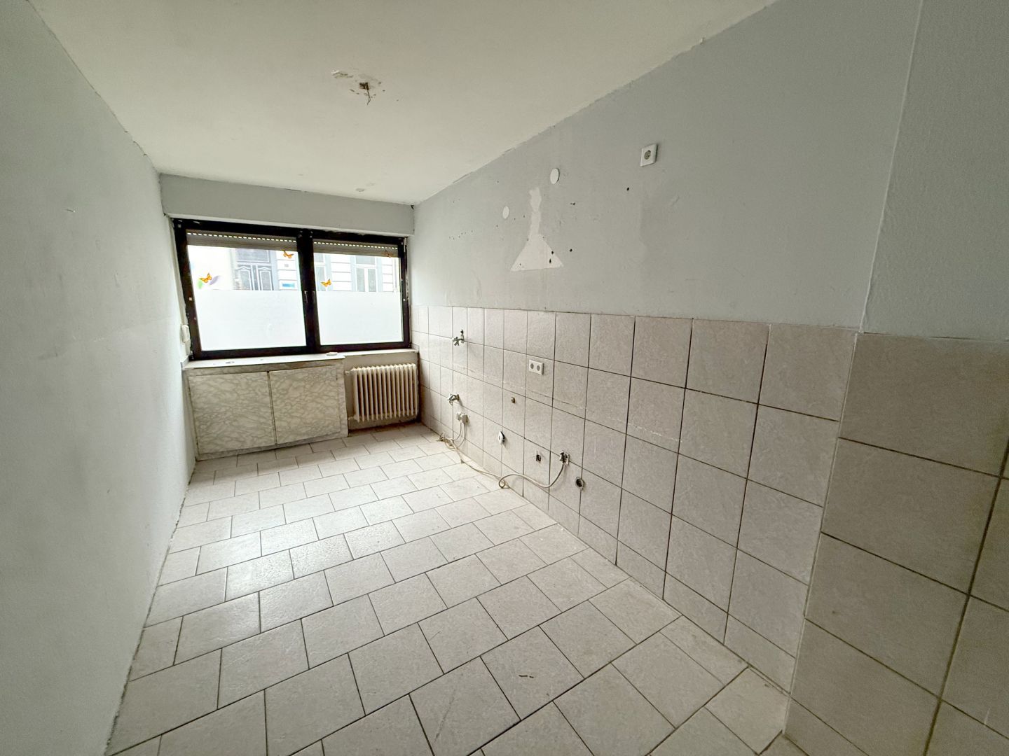 Ansicht 10 von: Hobbyhandwerker aufgepasst! Renovierungsbedürftige 3-Zimmerwohnung mit kleinem Garten in Krefeld